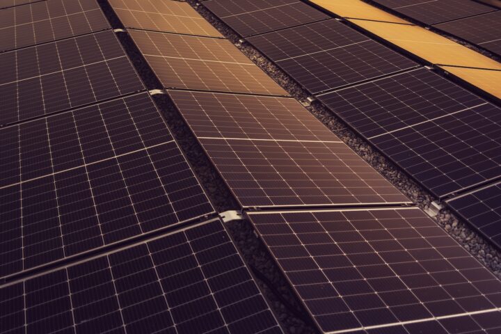 several rows of solar panels on a roof